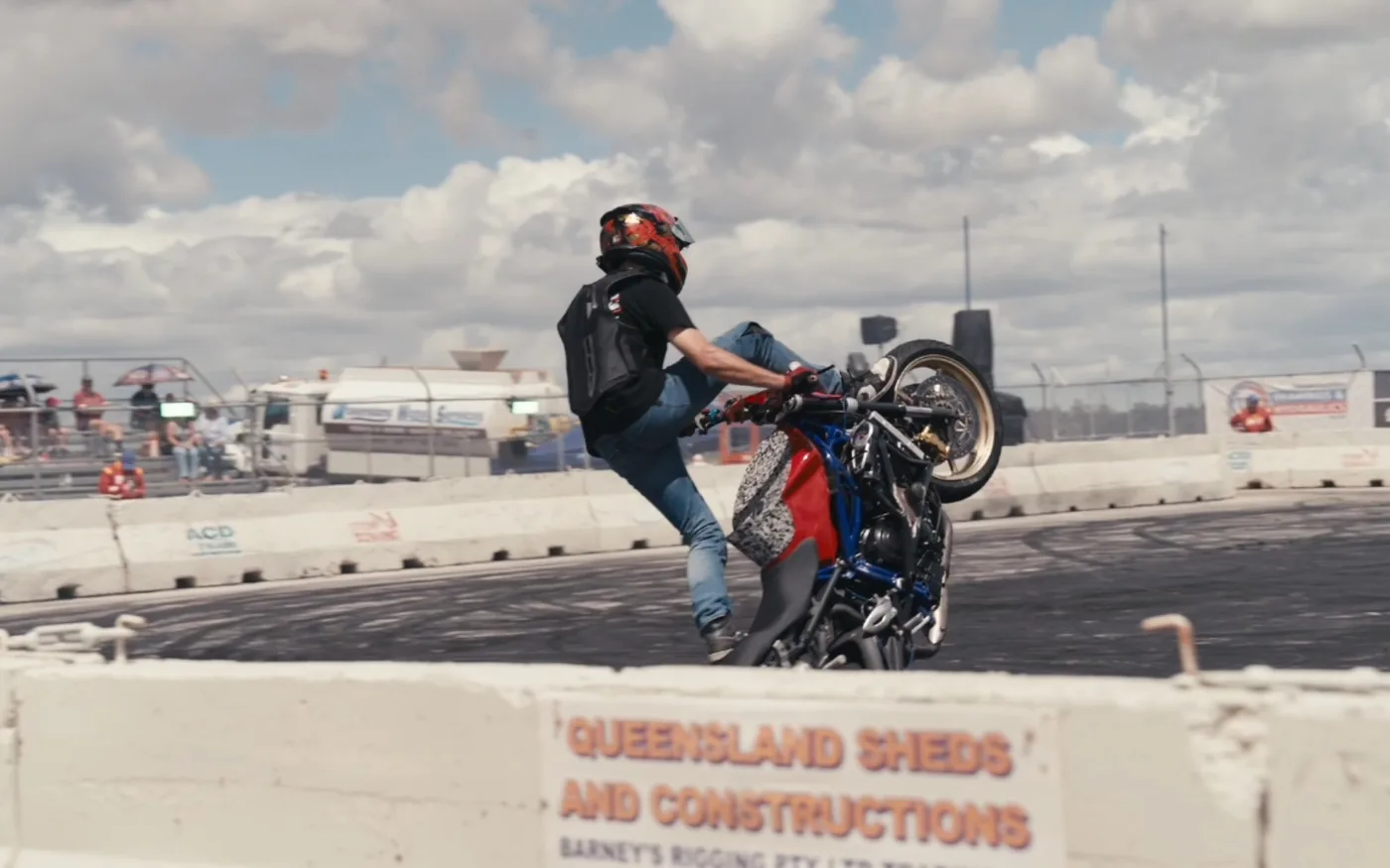 Ripple filming a stunt rider on location at a motorsport event